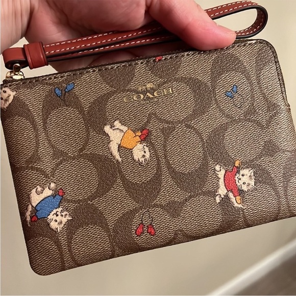 Coach Handbags - Coach Wristlet In Signature Canvas With Cat Mittens Print